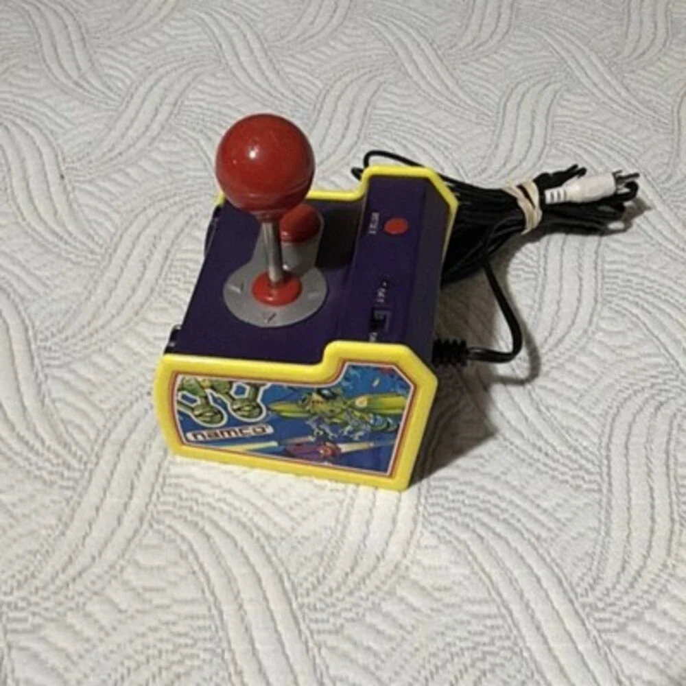 Namco Play TV Plug & Play Joystick Handheld Electronic Game Purple/Yellow